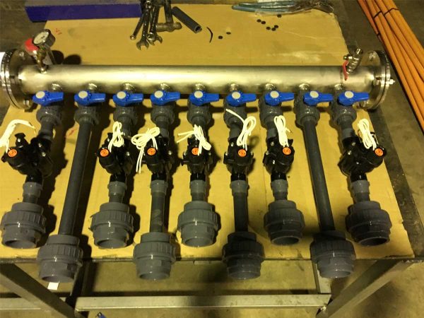welding water manifold pump feature