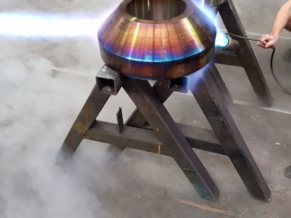 heating metal flange for metal machining brisbane