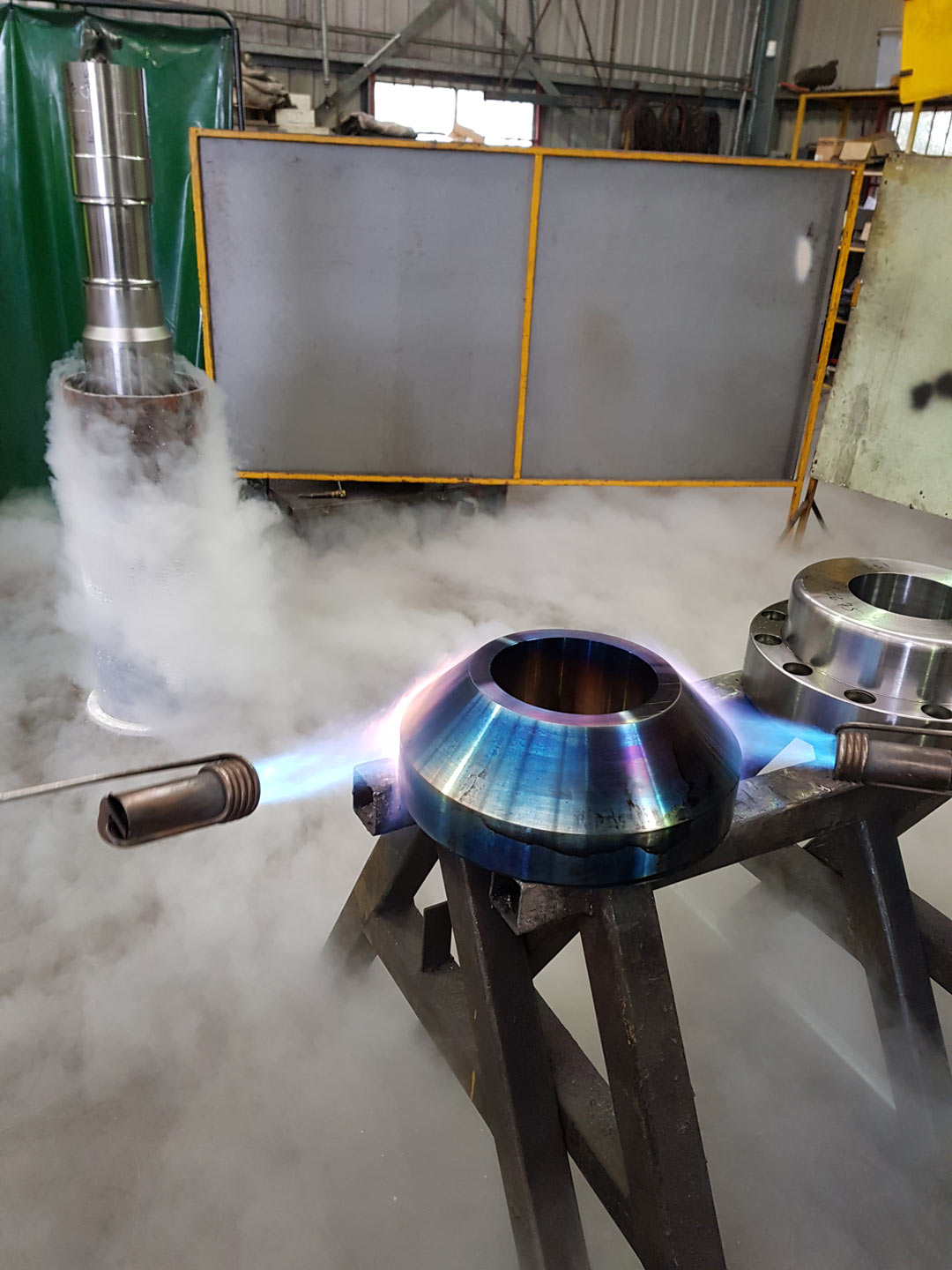 heating metal flange for metal machining brisbane